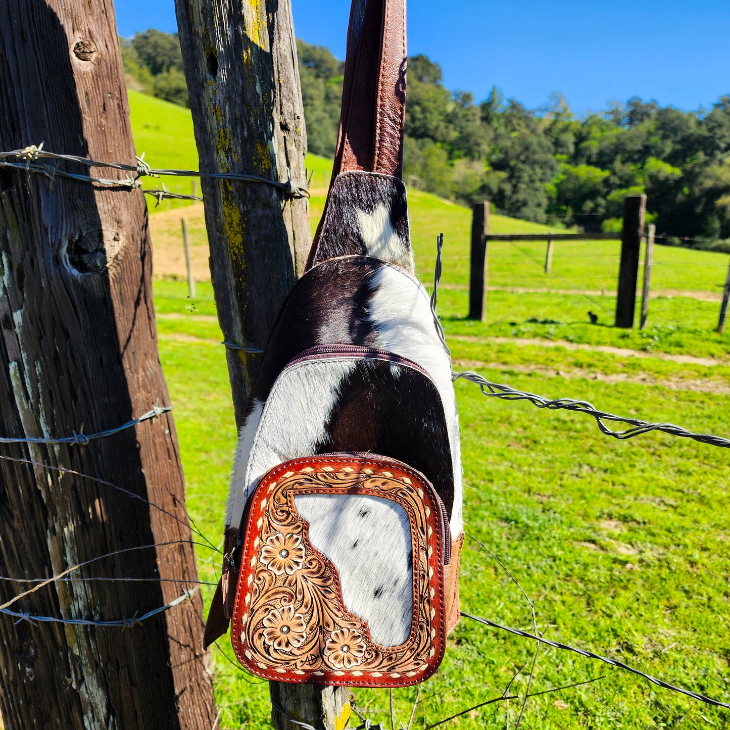 The Trisha Cowhide Sling Backpack